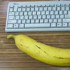 banana almost as big as computer keyboard