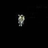 astronaut stands alone in space